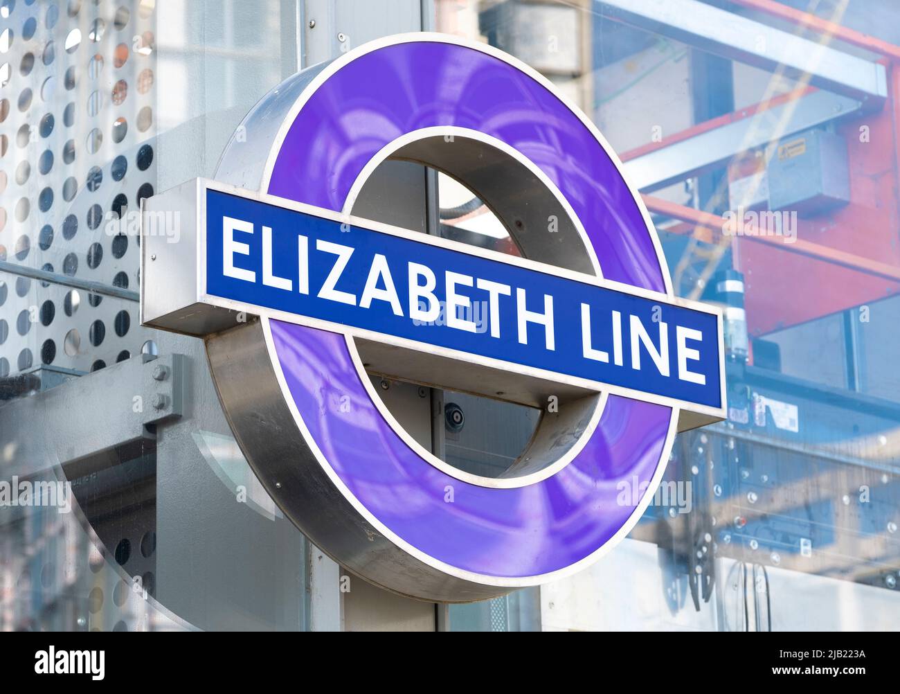 Iconic London Underground tube station sign for the Elizabeth Line at Abbey Wood, which opened as Queen Elizabeth II celebrates her Platinum Jubilee. Stock Photo