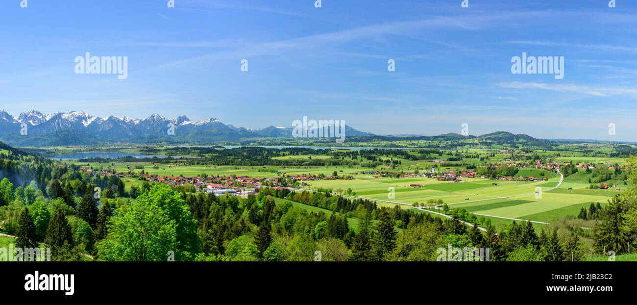 Idyllic view to springtime landscape in bavarian alpine foothills near Trauchgau in eastern Allgäu Stock Photo