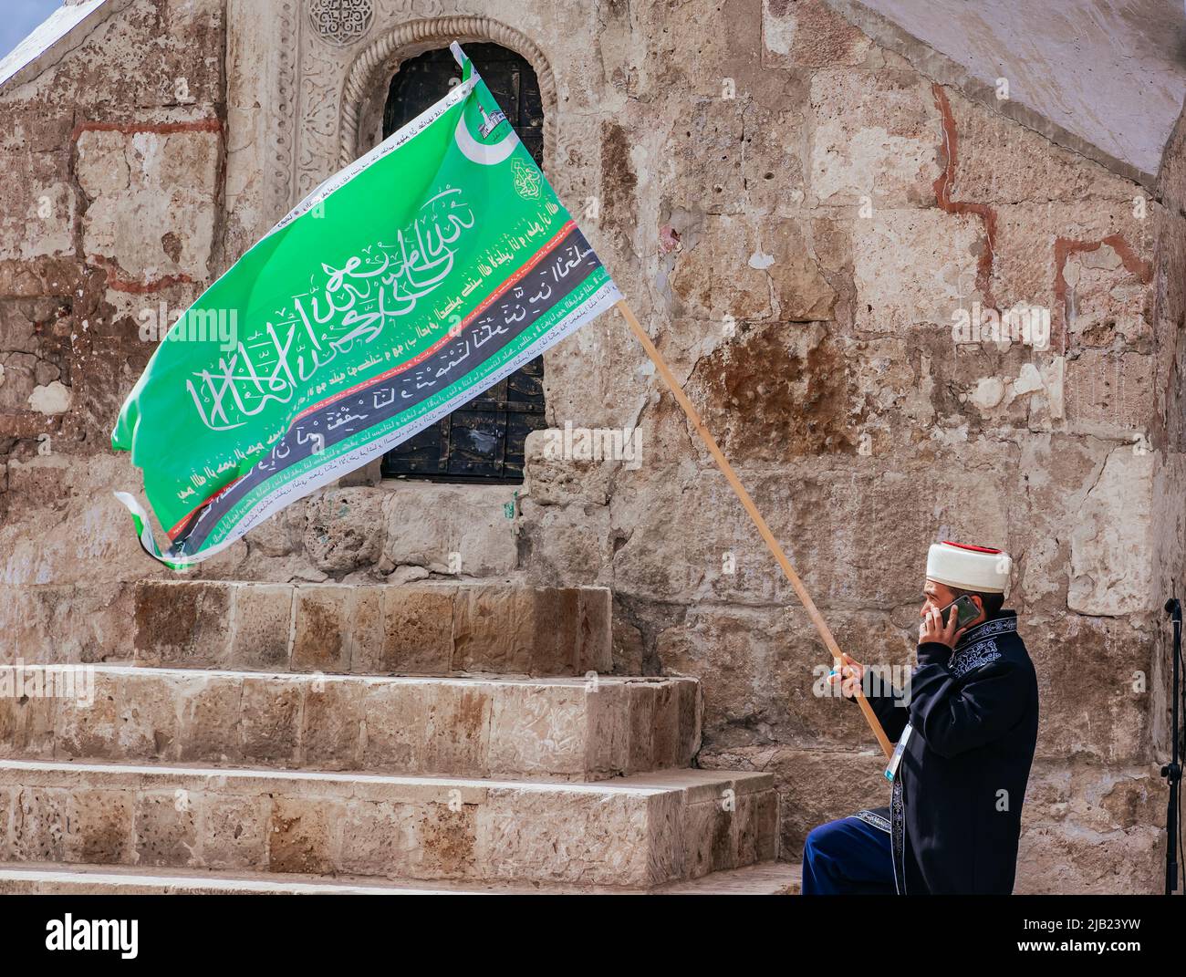 Bolgar, Tatarstan, Russia. May 21, 2022. The official flag of the Spiritual Administration of the Muslims of the Russian Federation. Flags at a Muslim festival. 1,100th anniversary of the adoption of Islam by the Volga Bulgars Stock Photo
