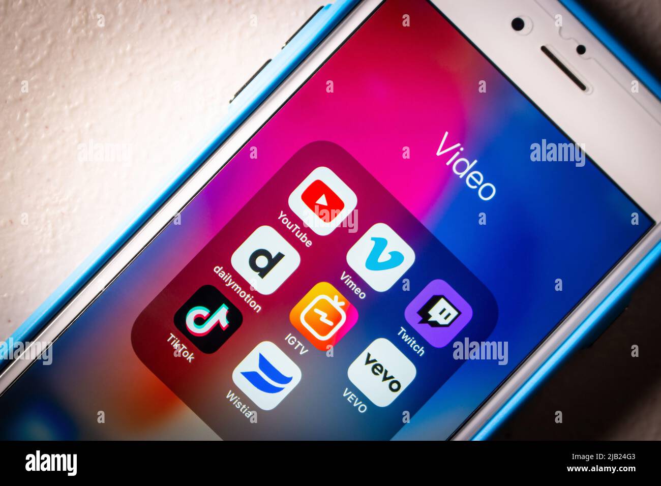 YouTube and competitors or alternatives (Vimeo, Twitch, Dailymotion, IGTV, Vevo, TikTok and Wistia) on an iPhone in a dark mood