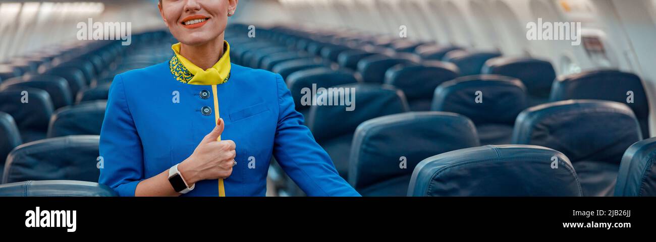 Young adult smiling airplane hi-res stock photography and images - Alamy
