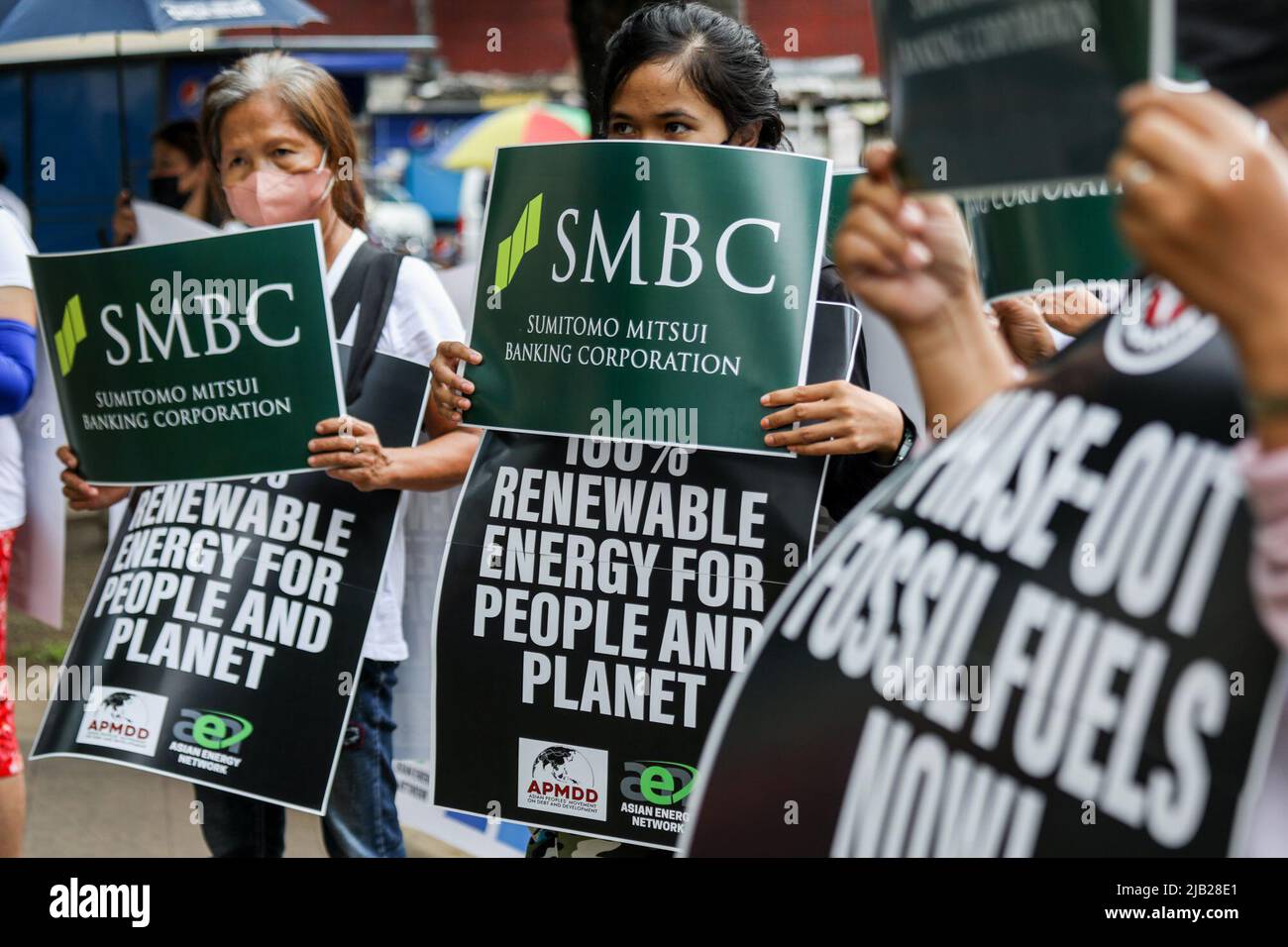 Manila, Philippines. 2nd June, 2022. Climate activists carry signs as they hold a rally against Japanese bank, Sumitomo Mitsui Banking Corporation (SMBC) in Makati City, Metro Manila, Philippines. June 2, 2022. The group called on SMBC, one of the world's top fossil fuel financiers, to shift from traditional fossil to clean energy in time with the bank's annual shareholders meeting in Tokyo. (Credit Image: © Basilio Sepe/ZUMA Press Wire) Credit: ZUMA Press, Inc./Alamy Live News Stock Photo