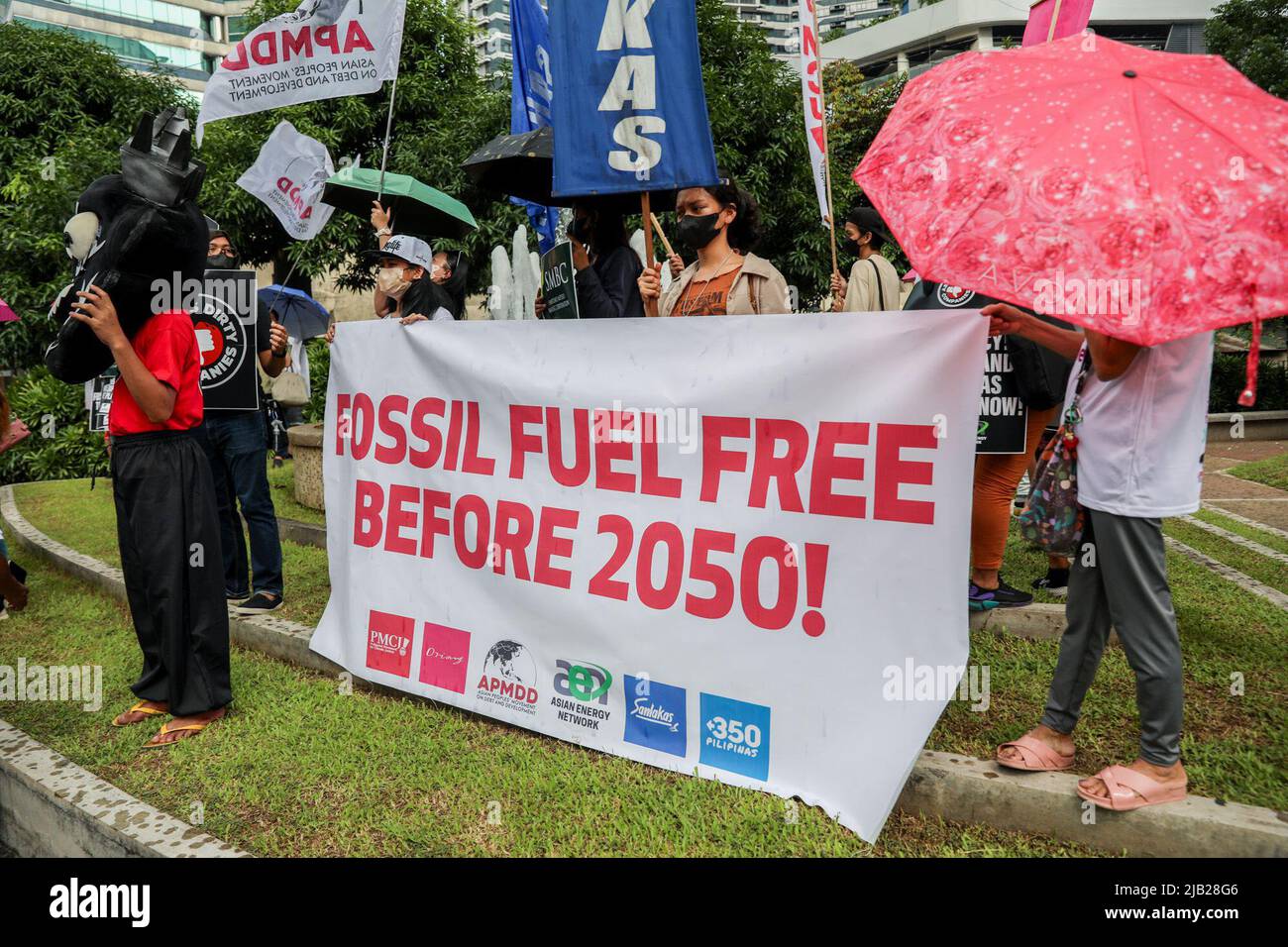 Manila, Philippines. 2nd June, 2022. Climate activists carry signs as they hold a rally against Japanese bank, Sumitomo Mitsui Banking Corporation (SMBC) in Makati City, Metro Manila, Philippines. June 2, 2022. The group called on SMBC, one of the world's top fossil fuel financiers, to shift from traditional fossil to clean energy in time with the bank's annual shareholders meeting in Tokyo. (Credit Image: © Basilio Sepe/ZUMA Press Wire) Credit: ZUMA Press, Inc./Alamy Live News Stock Photo