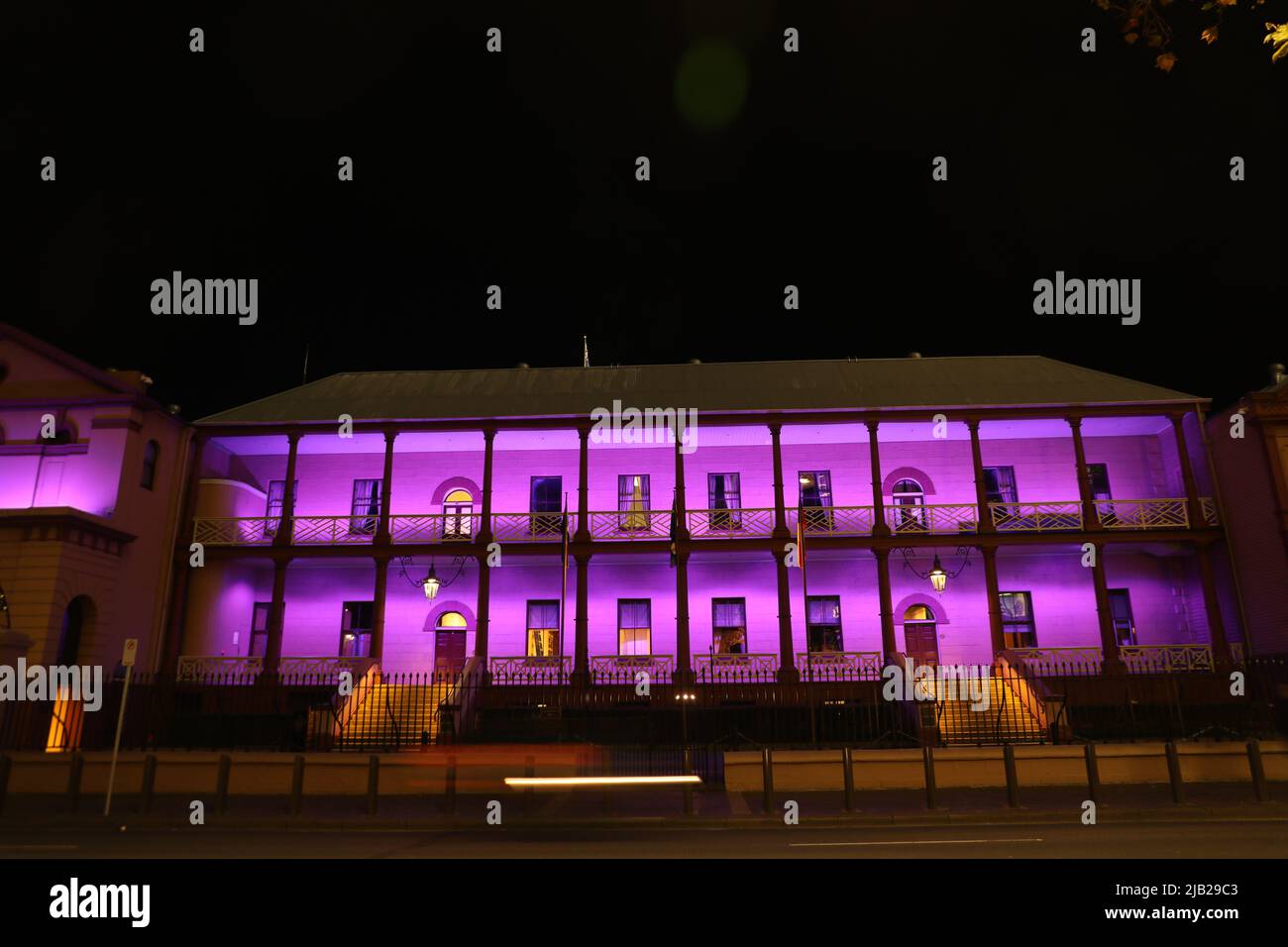 Sydney, Australia. 2nd June 2022. Pictured: the New South Wales Parliament House on Macquarie Street is lit up purple to mark the Queen’s Platinum Jubilee. Credit: Richard Milnes/Alamy Live News Stock Photo