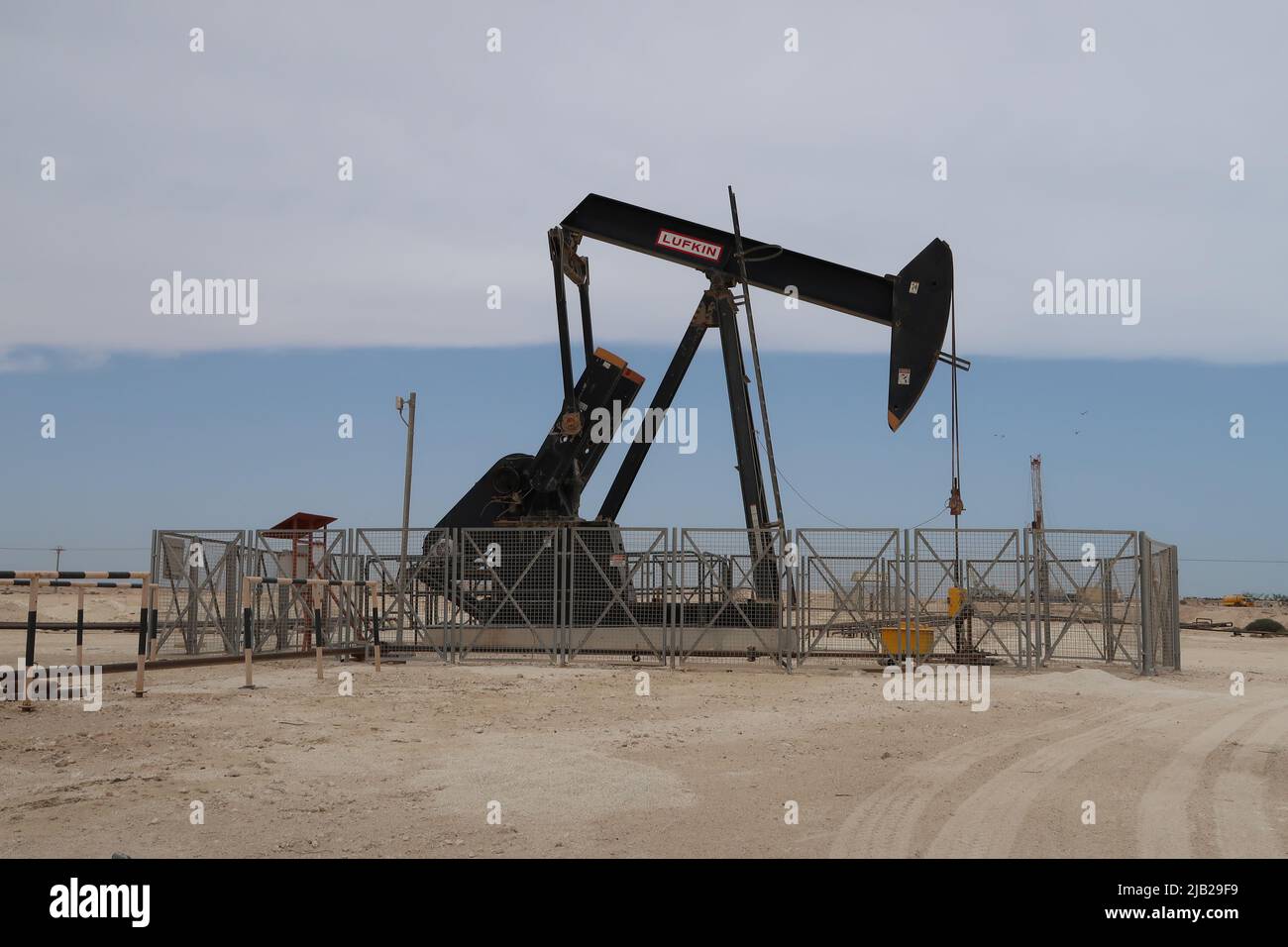 Pump jack, nodding donkey, Bahrain Stock Photo Alamy