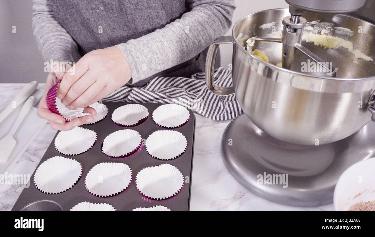 Step by step. Mixing ingredients in a standing kitchen mixer to bake ...