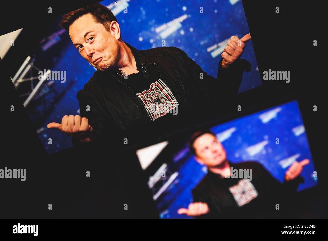 Elon Musk on screen. Elon Reeve Musk FRS is a business magnate and