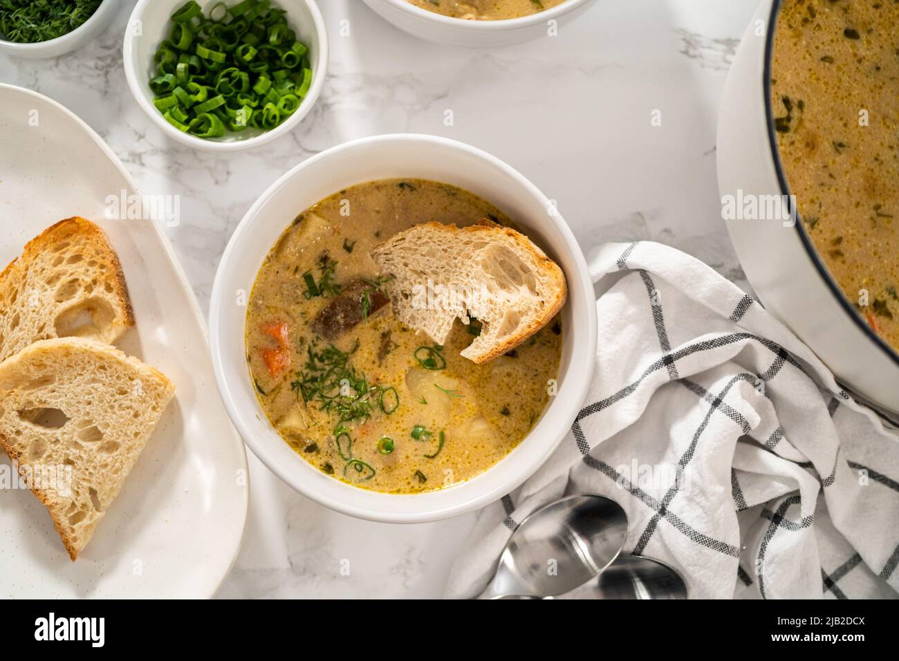 Serving creamy wild mushroom soup made out of dehydrated wild mushrooms