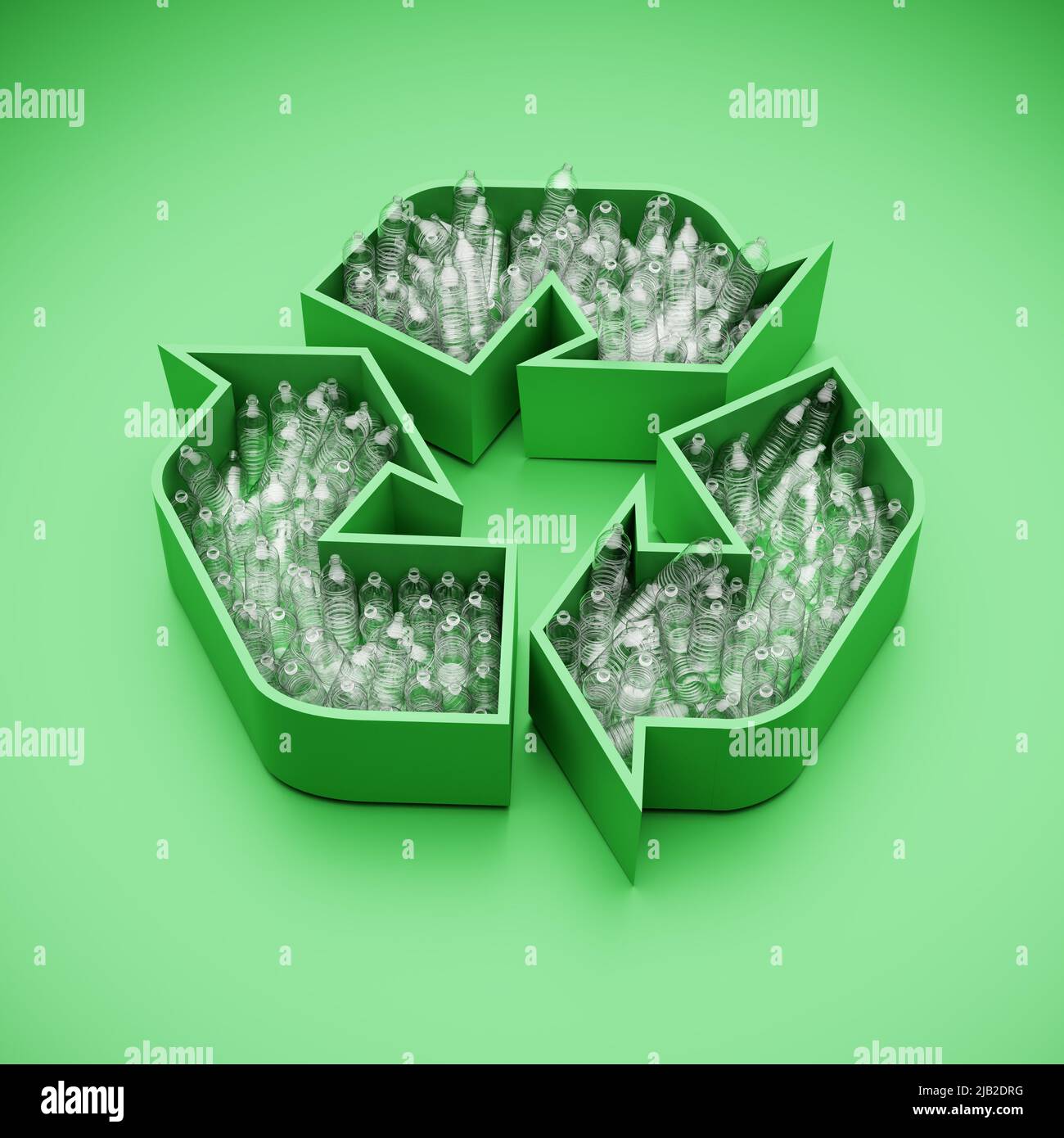Empty plastic water bottles in a green recycling logo. Concept for recycling of plastic waste. Stock Photo