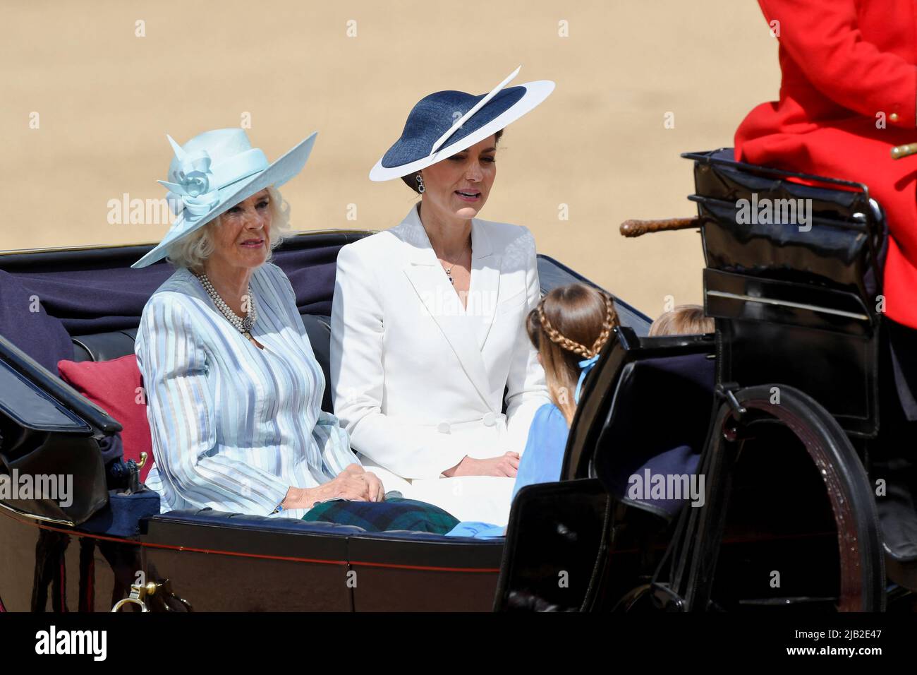 The Duchess of Cornwall (left) and the Duchess of Cambridge ride in a carriage during the Trooping the Colour ceremony at Horse Guards Parade, central London, as the Queen celebrates her official birthday, on day one of the Platinum Jubilee celebrations. Picture date: Thursday June 2, 2022. Stock Photo