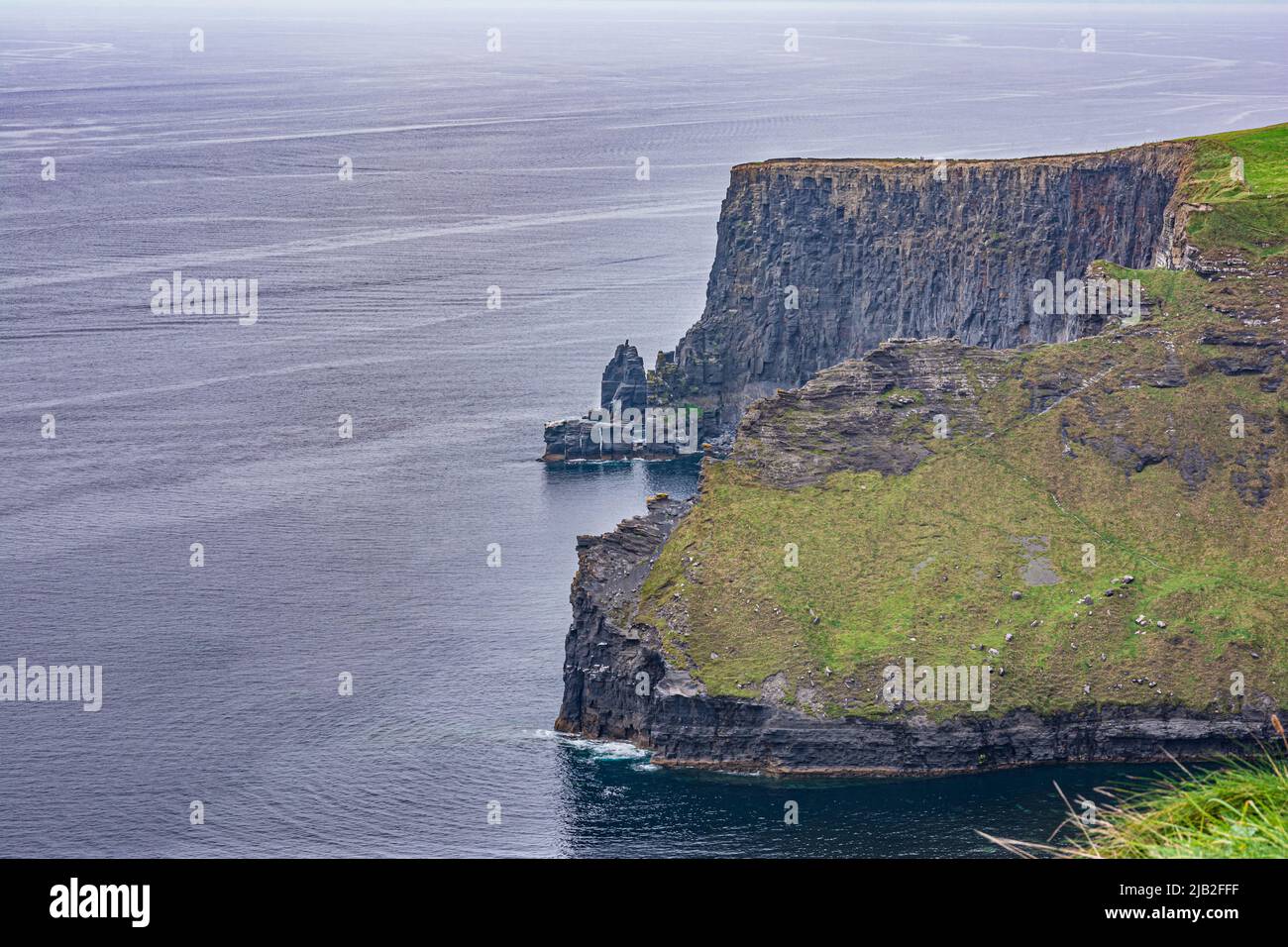 The famous Cliffs of Moher seen from the pathway, County Clare, Ireland Stock Photo