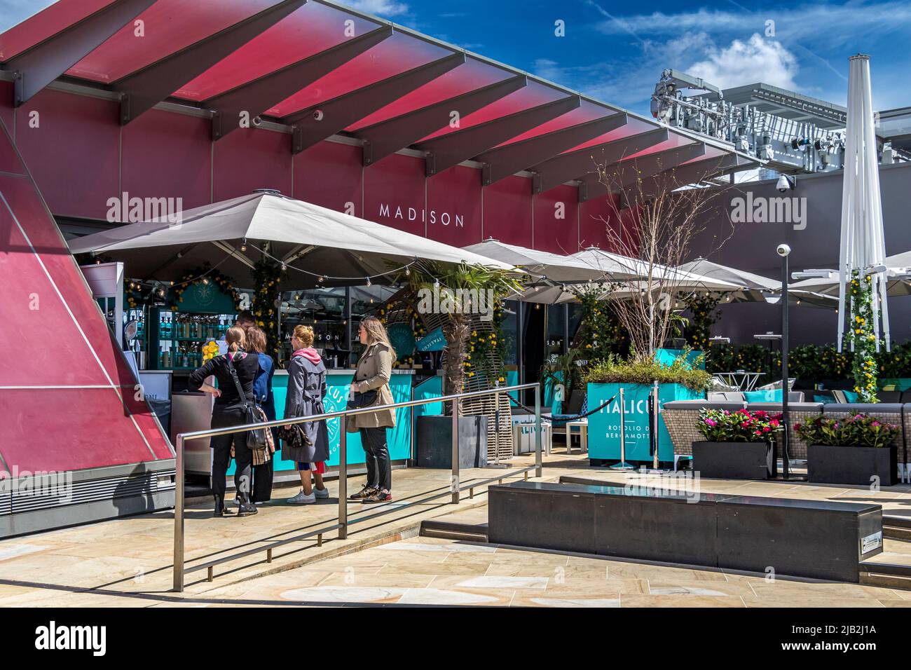 People socialising at Madison rooftop bar on the rooftop terrace at  One New Change, London EC4 Stock Photo