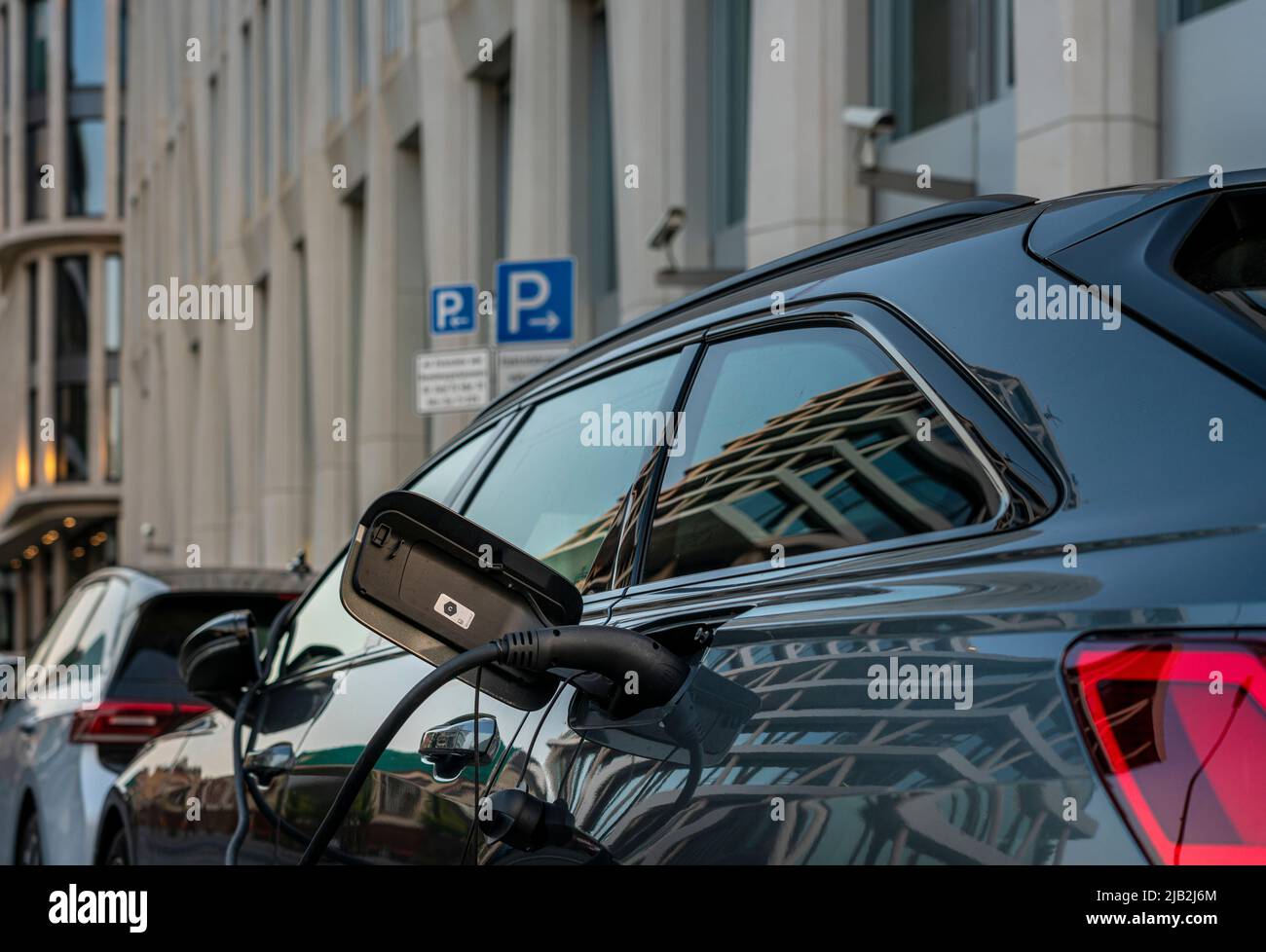 Electric car charging station in the city, Berlin, Germany Stock Photo Alamy