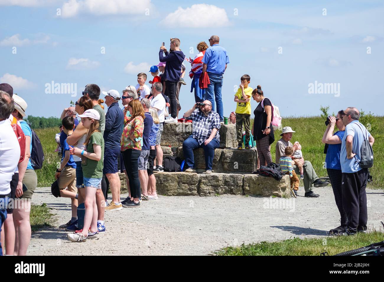 Rainham, Essex, UK. 2nd June, 2022. People on Ingrebourne Hill watching Platinum Jubilee RAF Flypast. Credit: Marcin Rogozinski/Alamy Live News Stock Photo