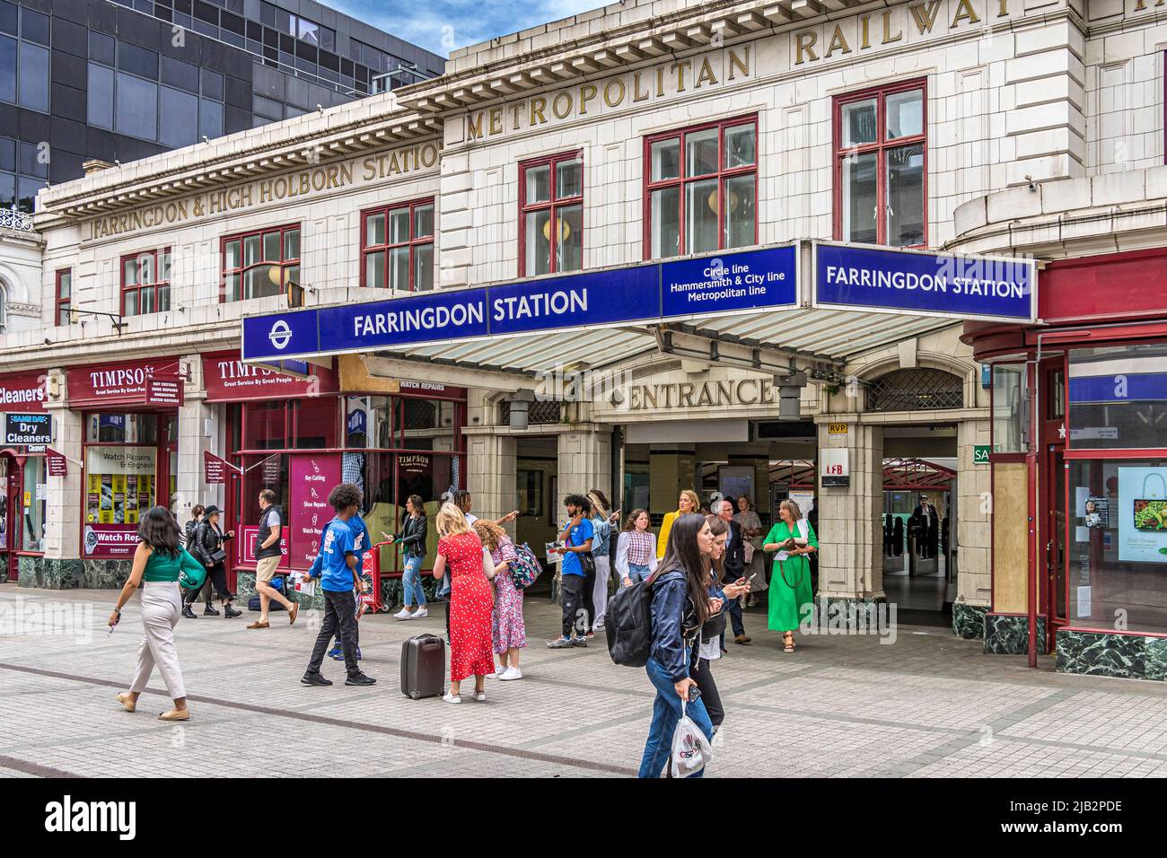People outside Farringdon Station on the London Underground ,which serves the Circle, Metropolitan and Hammersmith & City line Cowcross St, London EC1 Stock Photo