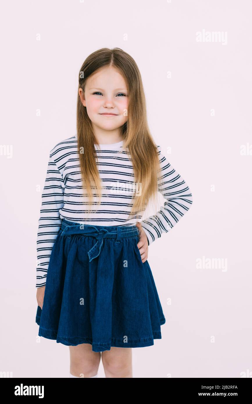 Adorable smiling little girl in dress isolated on a white Stock Photo ...