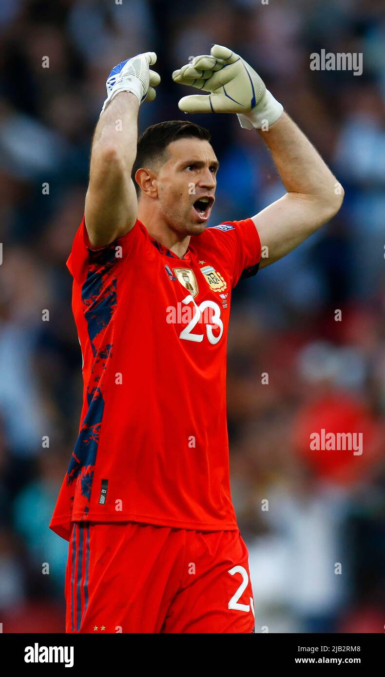 LONDON, ENGLAND - JUNE 01: Emiliano Martinez of Argentina celebrates Angel Di Maria of Argentina goal during Finalissima Conmebol - UEFA Cup of Champi Stock Photo