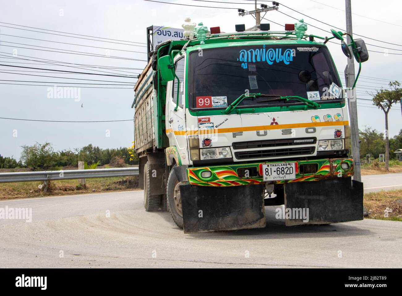 SAMUT PRAKAN, THAILAND, MARCH 23 2022, A truck drives on the rural road Stock Photo