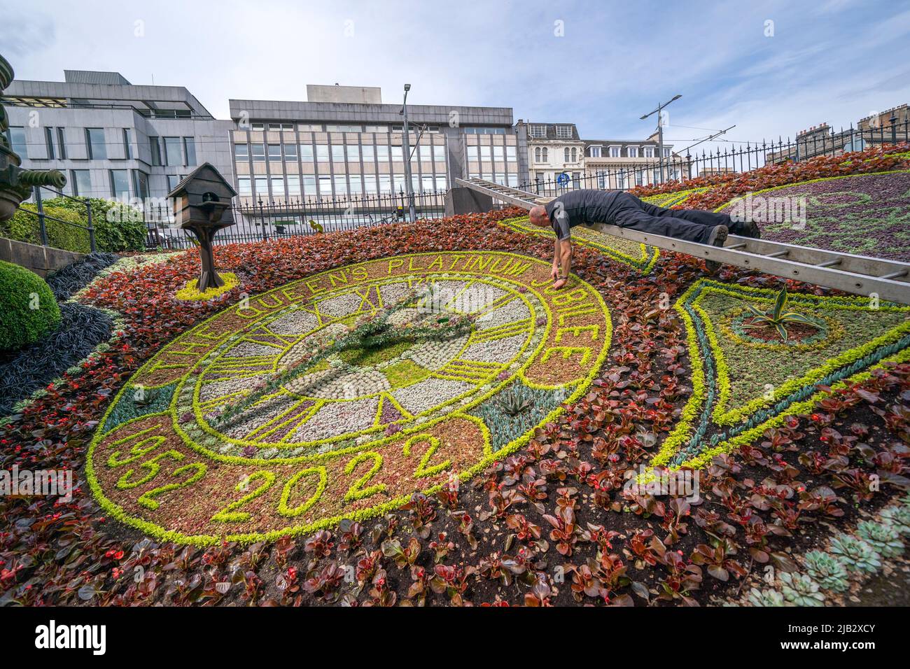 Head gardener David Dorward next to this year's design on the world's oldest Floral Clock in West Princes Street Gardens in Edinburgh, on day one of the Platinum Jubilee celebrations. Picture date: Thursday June 2, 2022. Stock Photo