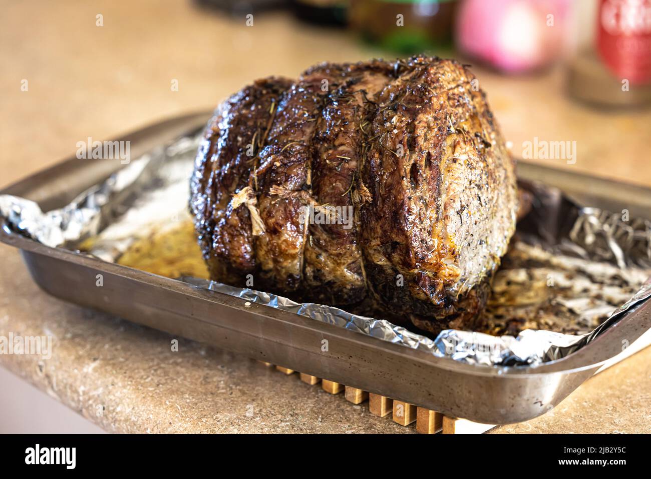 A large prime rib beef roast that was baked and roasted in the oven by