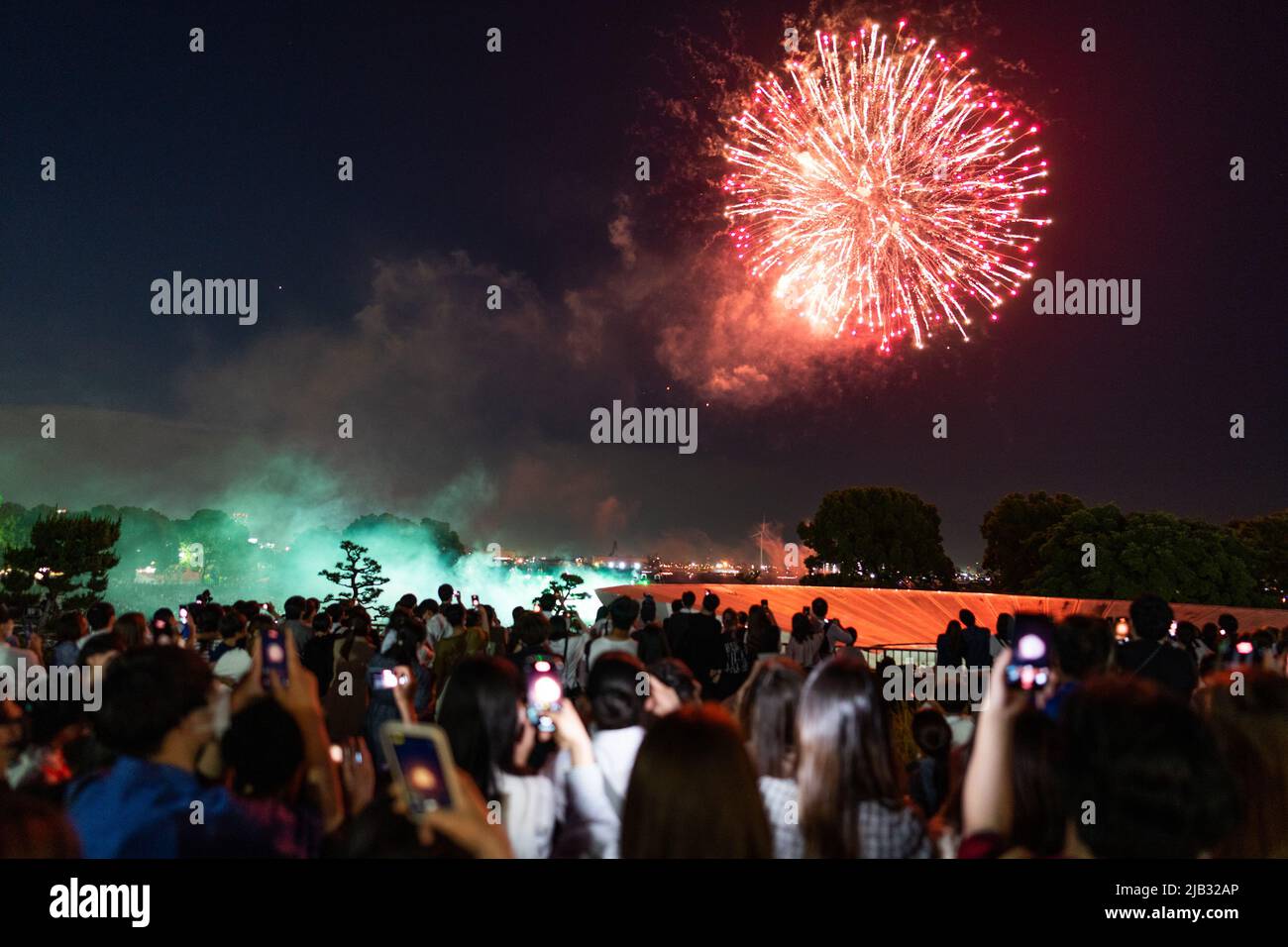 (220602) -- YOKOHAMA, June 2, 2022 (Xinhua) -- People watch fireworks during the Yokohama Port Opening Festival in Yokohama, Japan, June 2, 2022. (Xinhua/Zhang Xiaoyu) Stock Photo