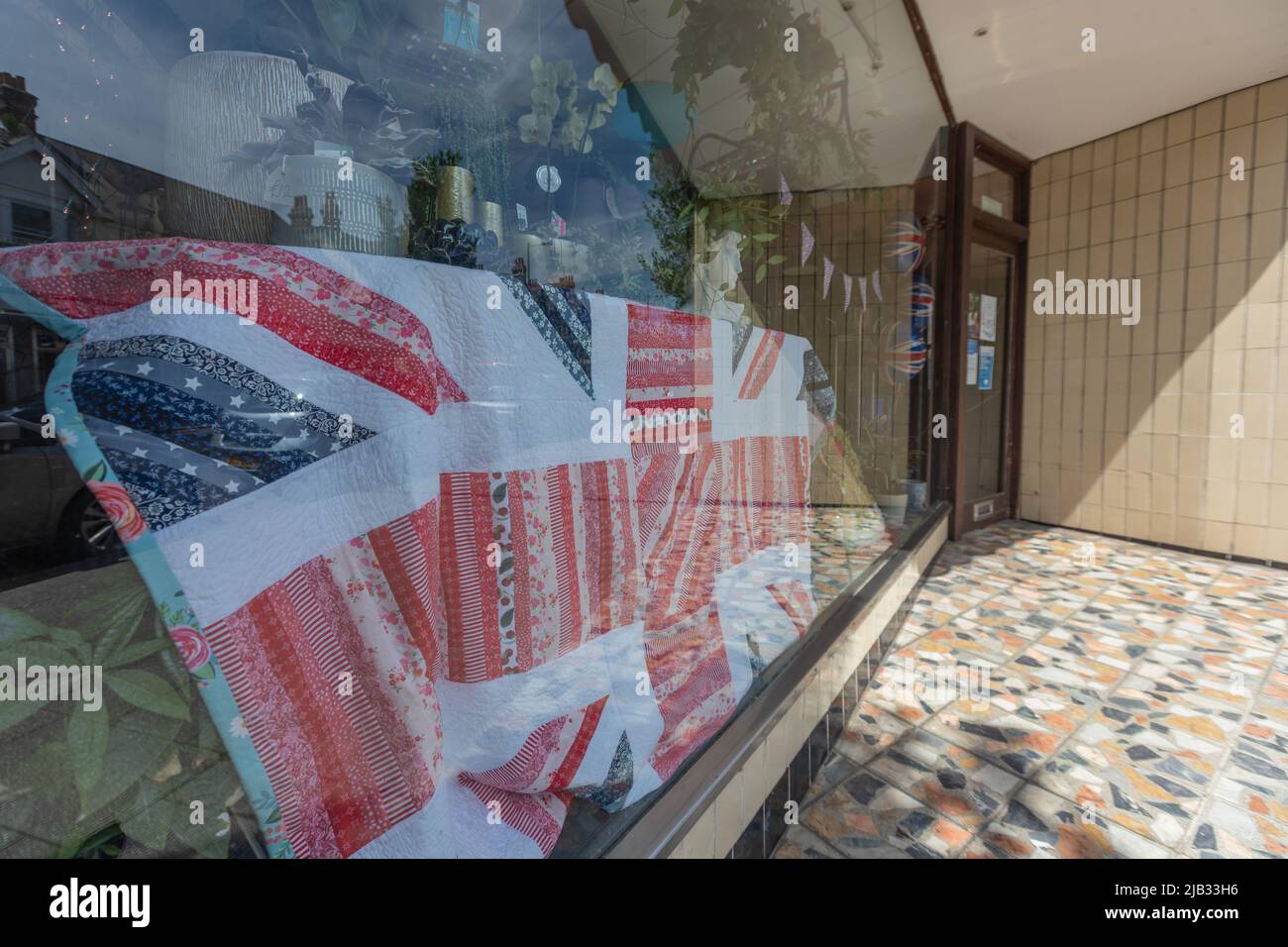 Southend on sea, UK. 2nd June, 2022. A quilted blanket in a florists shop. Scenes around Southend on Sea as people celebrate the Queens Platinum Jubilee and the bank holiday. Penelope Barritt/Alamy Live News Stock Photo