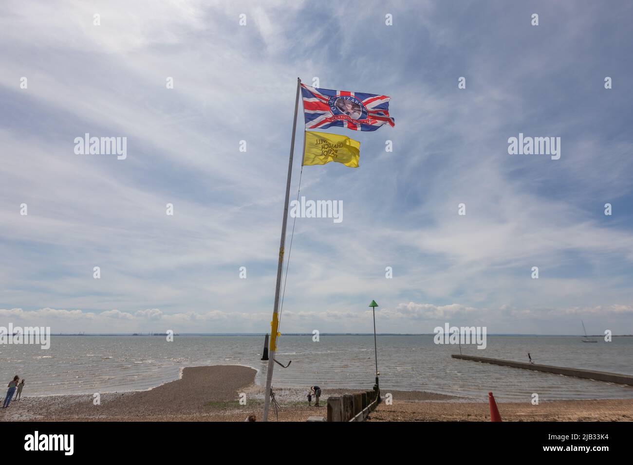 Southend on sea, UK. 2nd June, 2022. A flag at Chalkwell beach. Scenes around Southend on Sea as people celebrate the Queens Platinum Jubilee and the bank holiday. Penelope Barritt/Alamy Live News Stock Photo