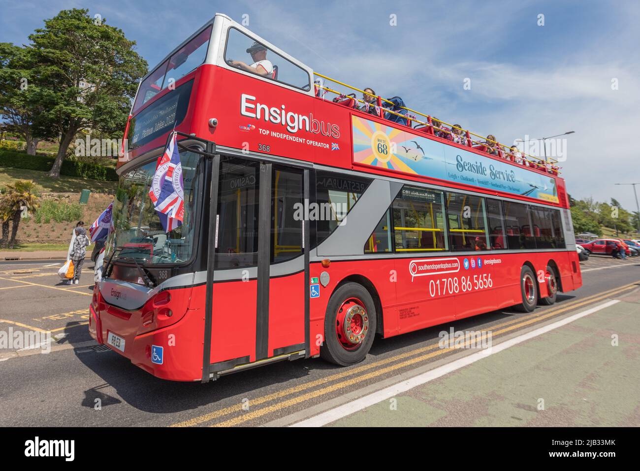 Southend on sea, UK. 2nd June, 2022. An open top bus with flags and bunting on the seafront. Scenes around Southend on Sea as people celebrate the Queens Platinum Jubilee and the bank holiday. Penelope Barritt/Alamy Live News Stock Photo