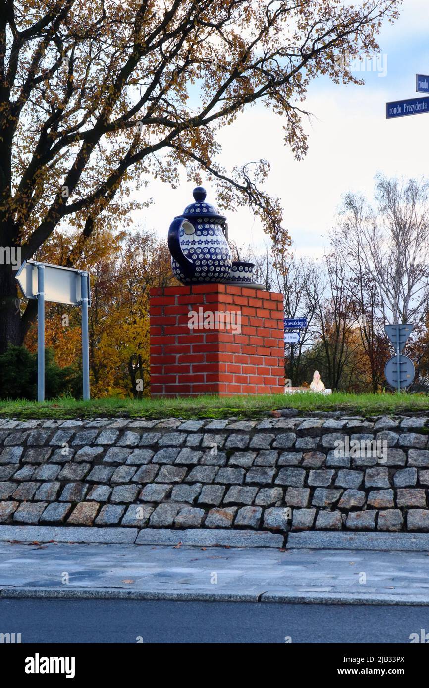 Polish pottery tea pot and mug decorations on a roundabout in Boleslawiec, Poland. Stock Photo
