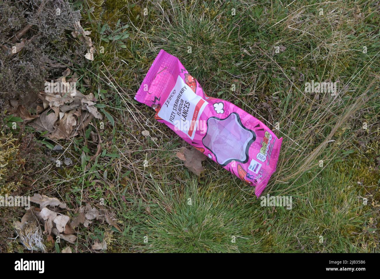 discarded empty packet of sweets Stock Photo