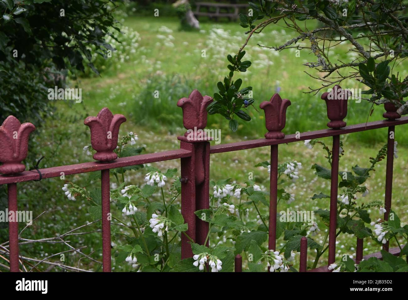 red painted garden railings Stock Photo