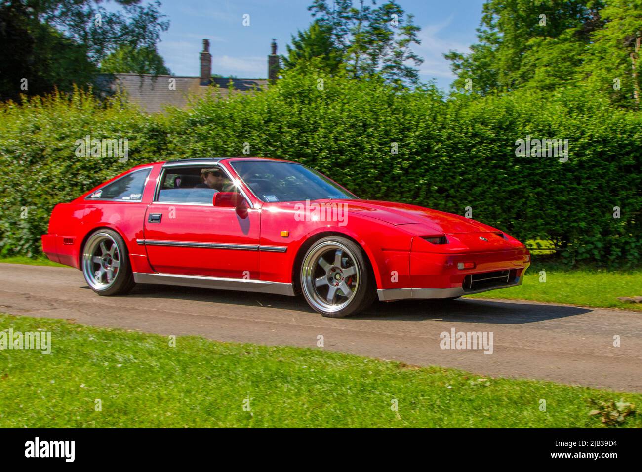 1988 80s eighties red Nissan 300 ZX 300ZX 2960cc 5 speed manual 2dr coupe, arriving in Worden Park Motor Village for the Leyland Festival, UK Stock Photo