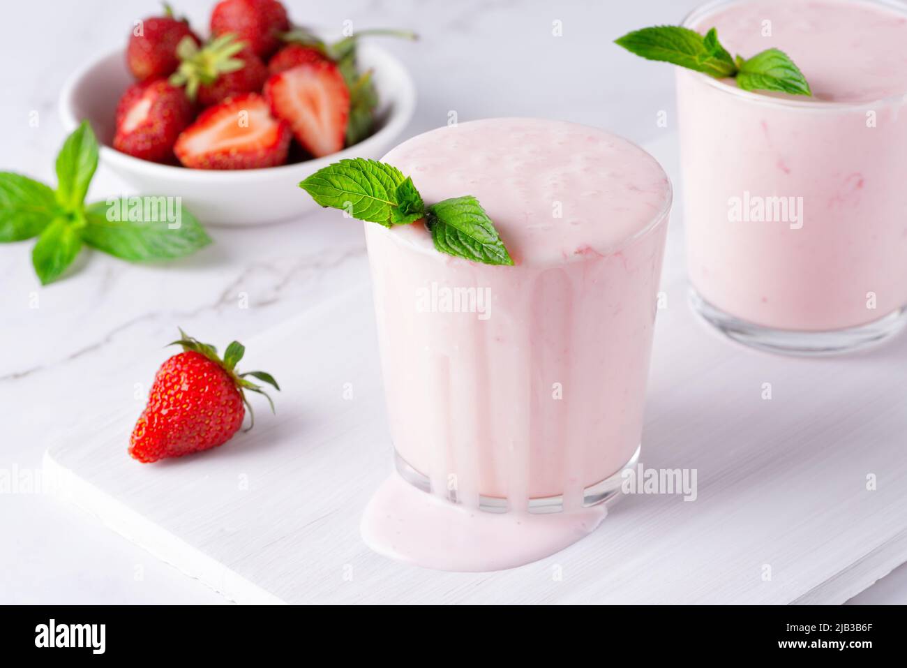 Yogurt , buttermilk or kefir with strawberry. Yogurt in glass Stock