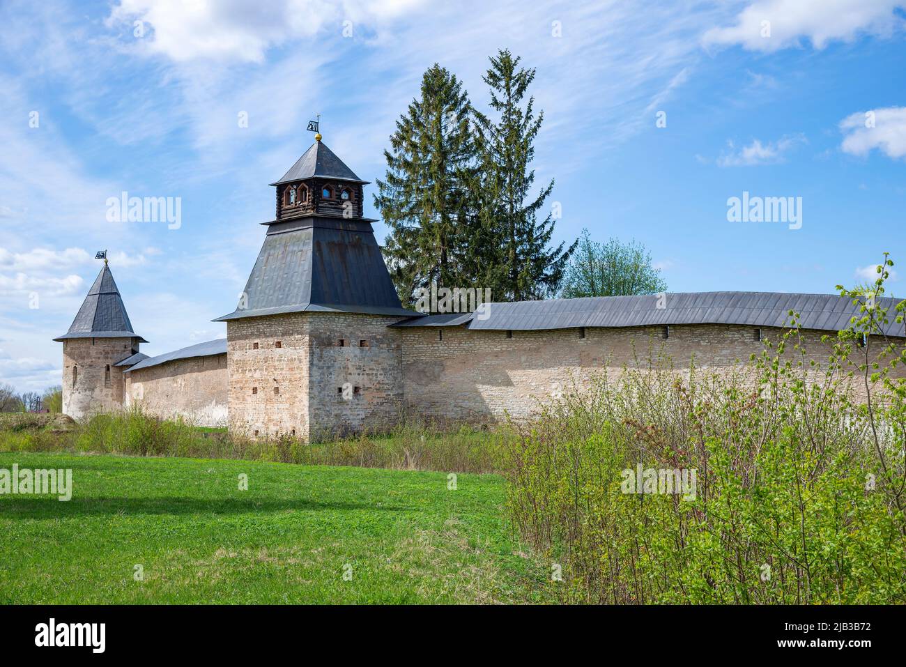 Spring day at the walls of the old Pskovo-Pechersky monastery. Russia, Pskov region Stock Photo