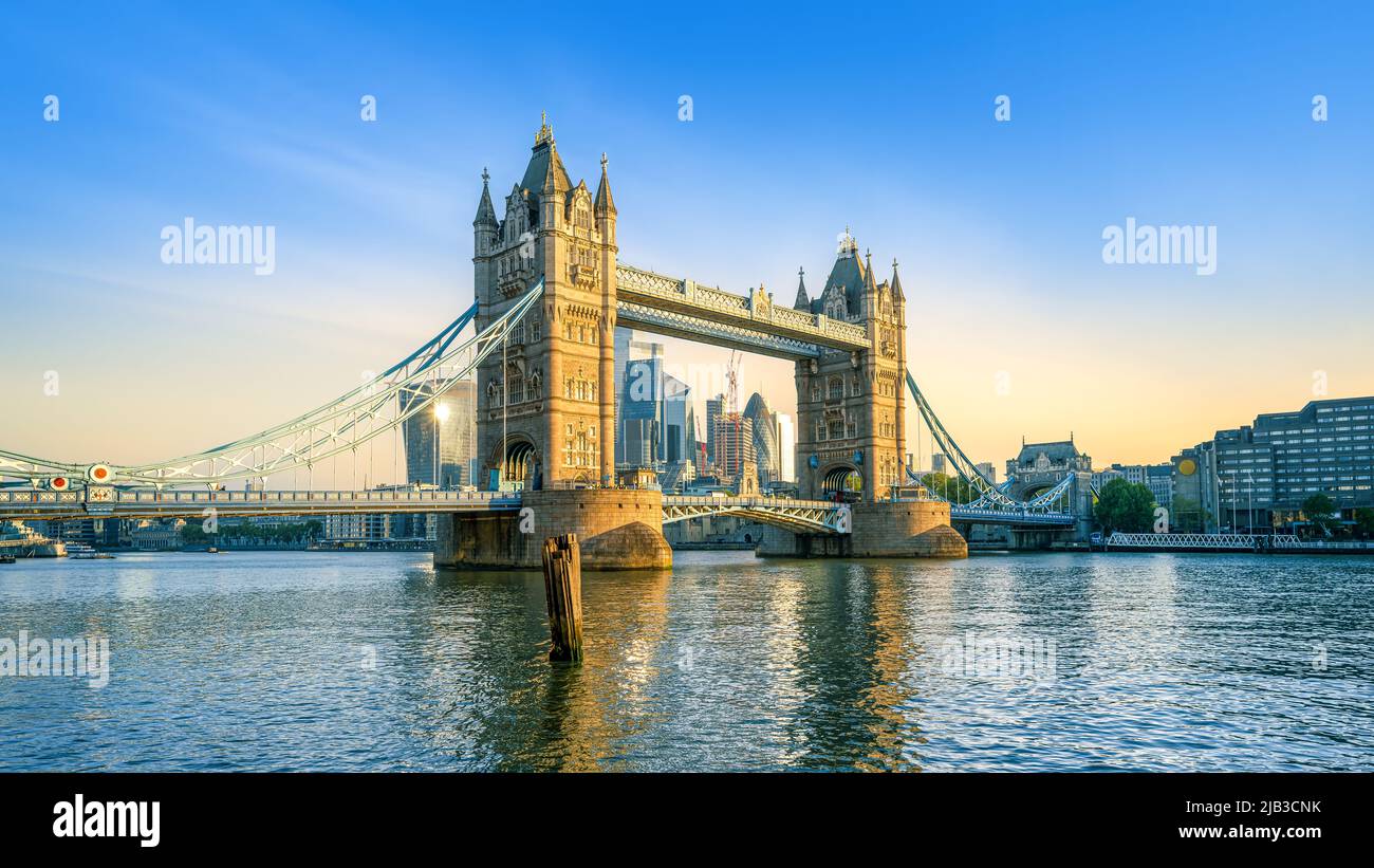 the famous tower bridge of london in the early morning sun Stock Photo