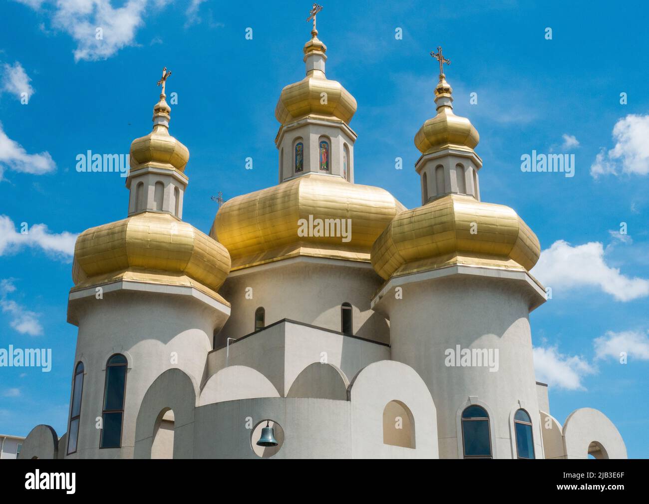 St. Michael the Archangel Ukrainian Catholic Church wih blue sky and clouds Baltimore Maryland Stock Photo
