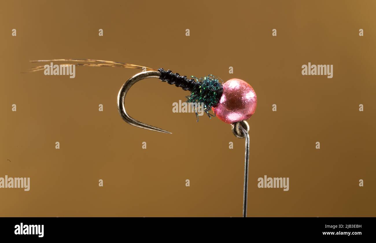 https://c8.alamy.com/comp/2JB3EBH/fly-for-trout-fishing-prepared-for-catching-fish-with-barbless-hooklimerickirelandjuneo12022-2JB3EBH.jpg