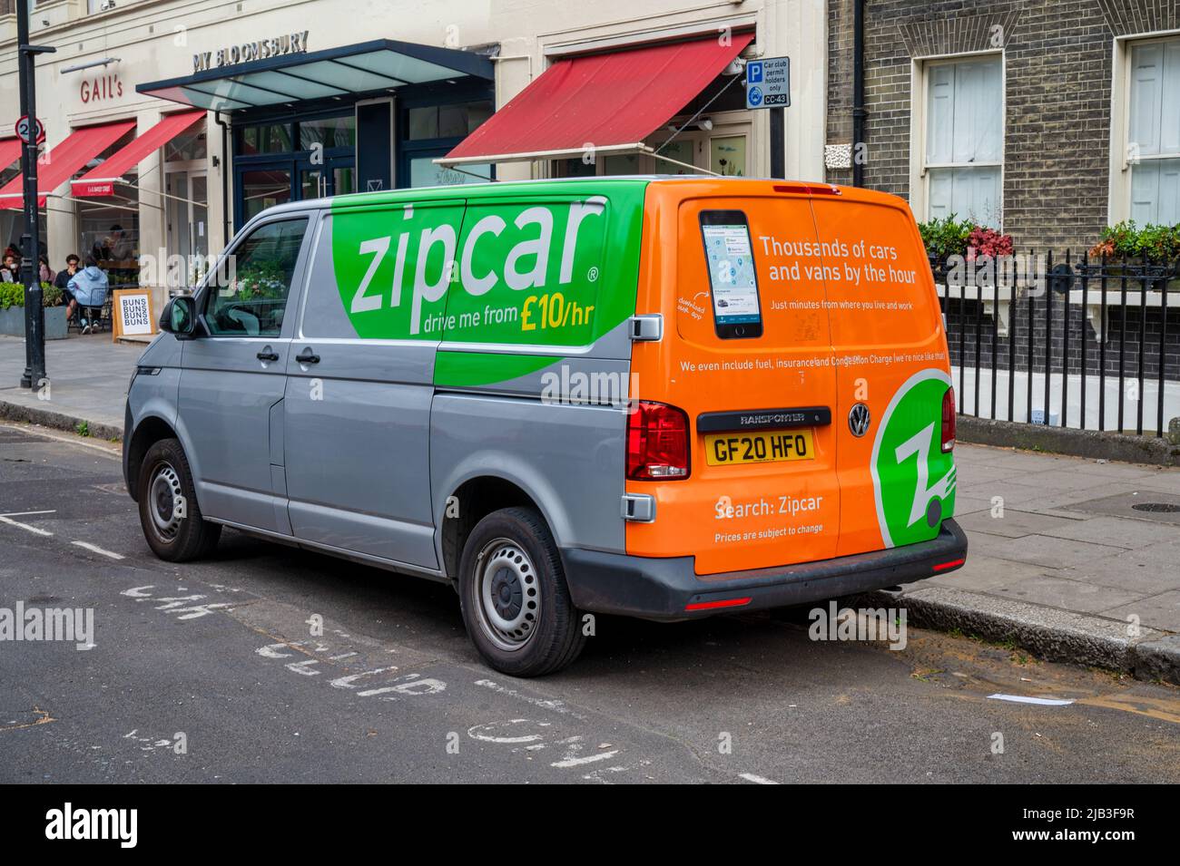 London, UK- May 3, 2022: A ZipCar rental van parked up on the side of the road in London Stock Photo