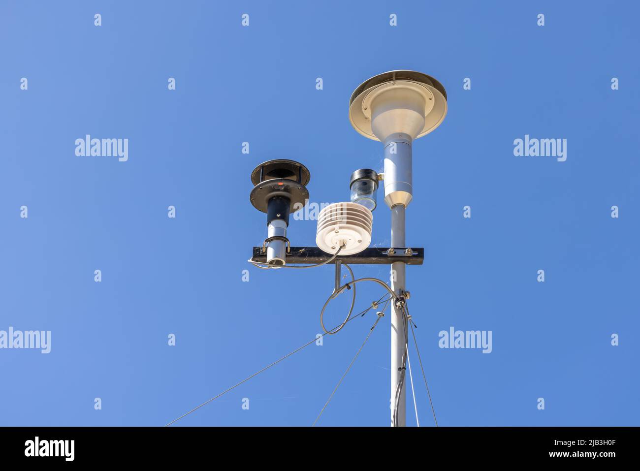 Local weather station for the measurement of temperature, ambient relative humidity rain precipitation and barometric pressure Stock Photo