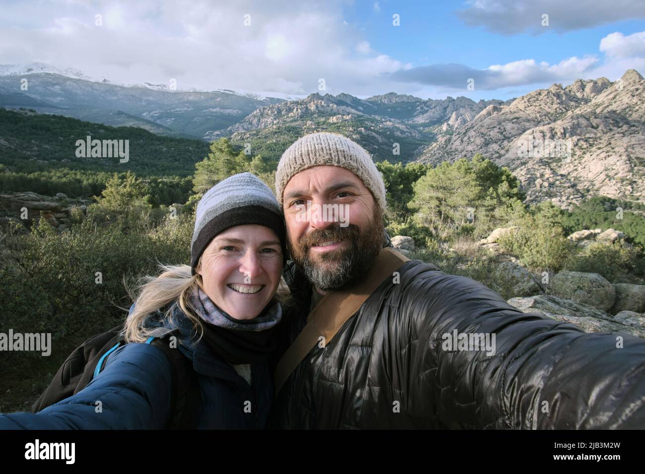 Couple taking a selfie in the mountains Stock Photo