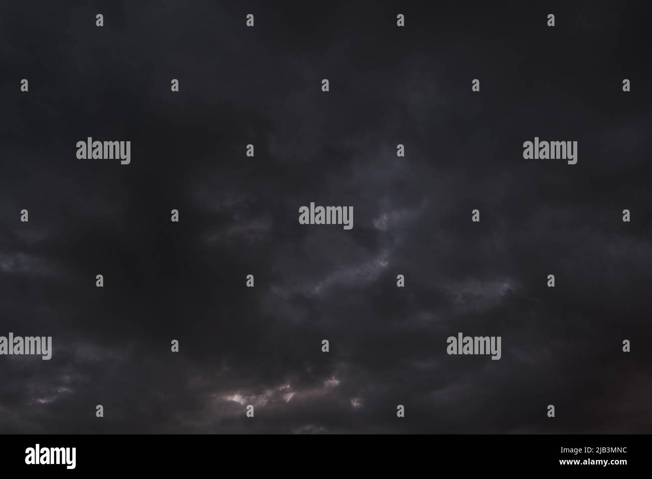 Abstract, dramatic background dark storm clouds Stock Photo - Alamy
