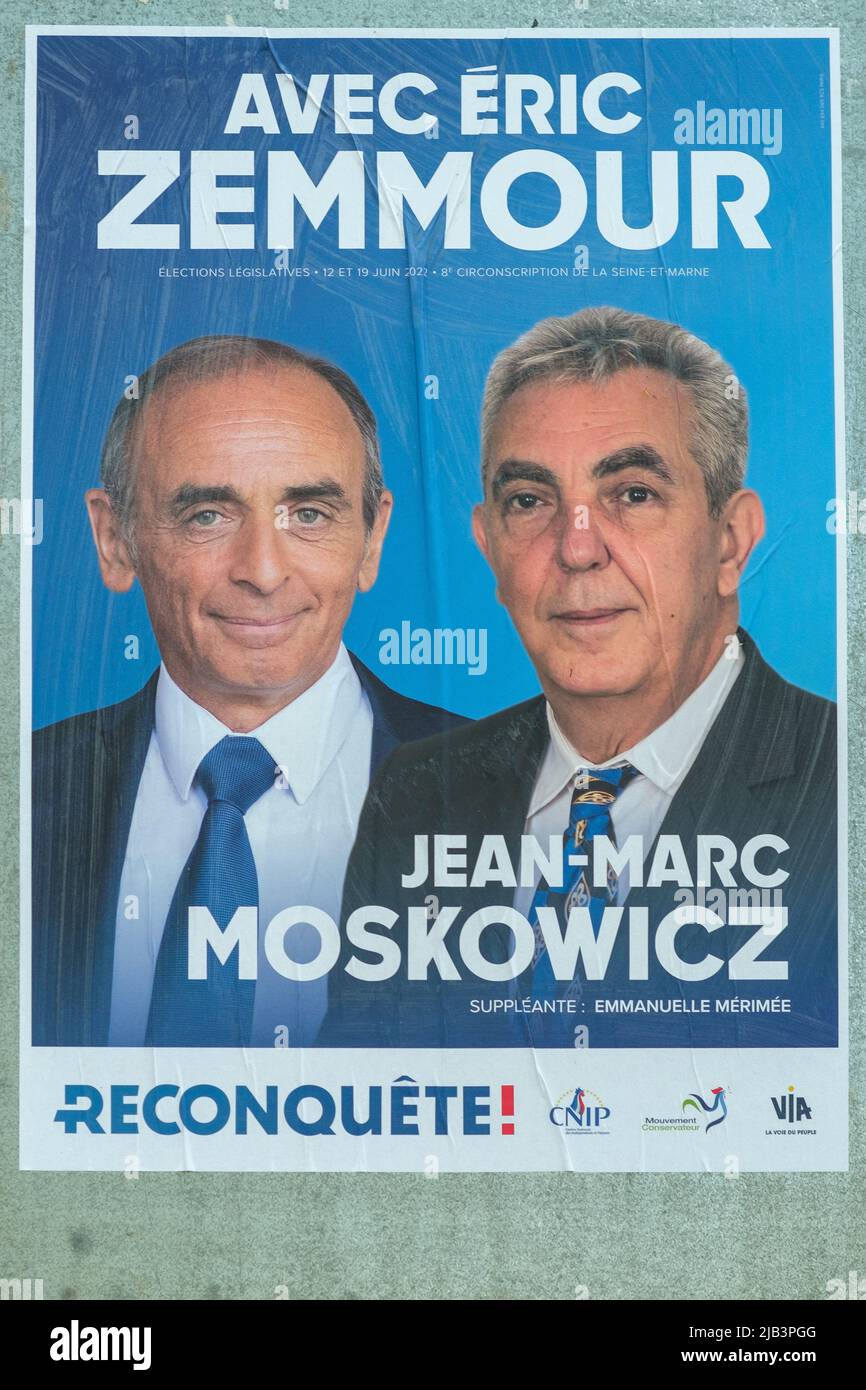 Paris, France - June 2, 2022 : Portrait of Eric Zemmour and Jean-Marc Moscowicz on a campaign poster in Paris Stock Photo