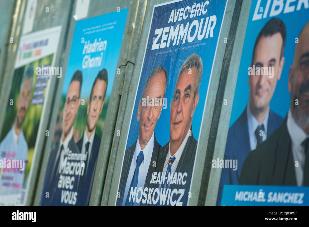 Paris, France - June 2, 2022 : Portrait of Eric Zemmour,  Jean-Marc Moscowicz and other politician leaders on a campaign poster in Paris Stock Photo