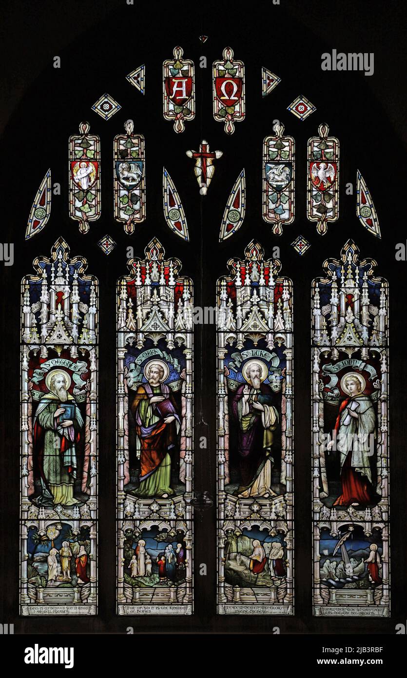 A stained glass window depicting the Four Evangelists, Church of St James the Great Church, Dursley, Gloucestershire Stock Photo