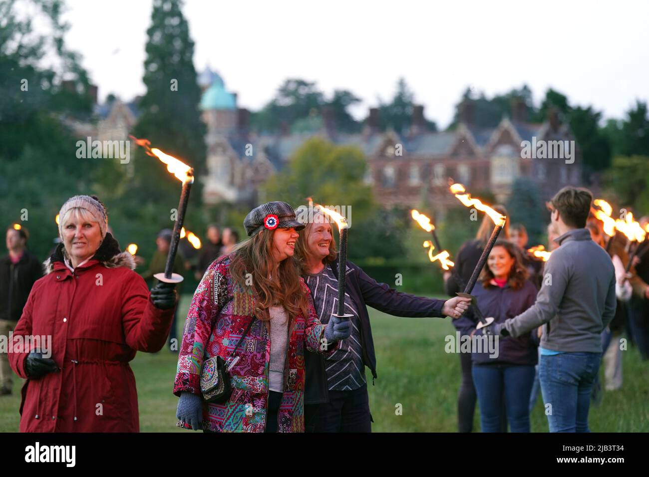 The torchbearers before lighting a Platinum Jubilee beacon on the Queen