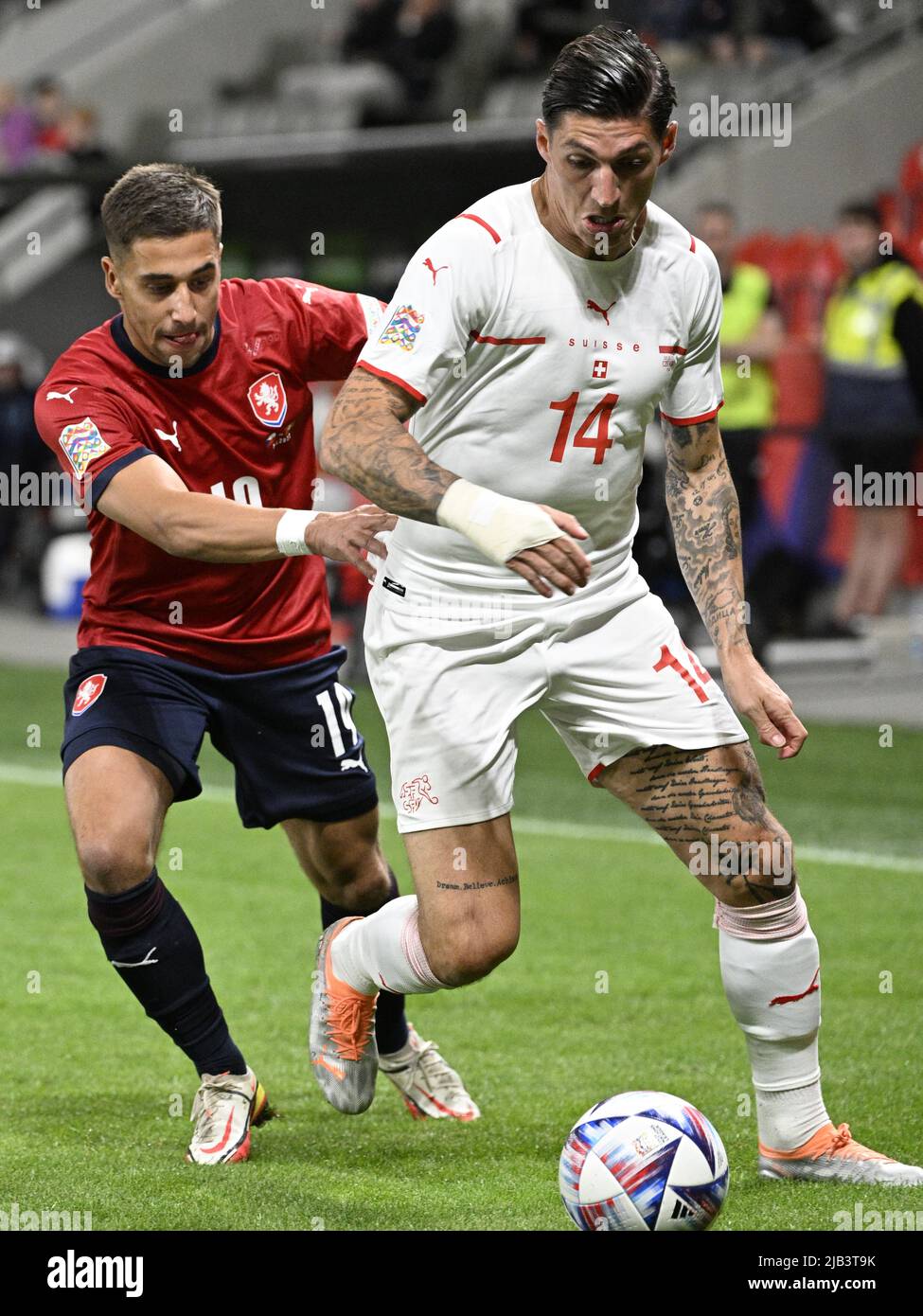 Prague, Czech Republic. 02nd June, 2022. Ondrej Lingr of Czech Republic, left, and Steven Zuber of Switzerland in action during the 1st round A2 group soccer Nations League match Czech Republic vs Switzerland in Prague, Czech Republic, June 2, 2022. Credit: Michal Kamaryt/CTK Photo/Alamy Live News Stock Photo