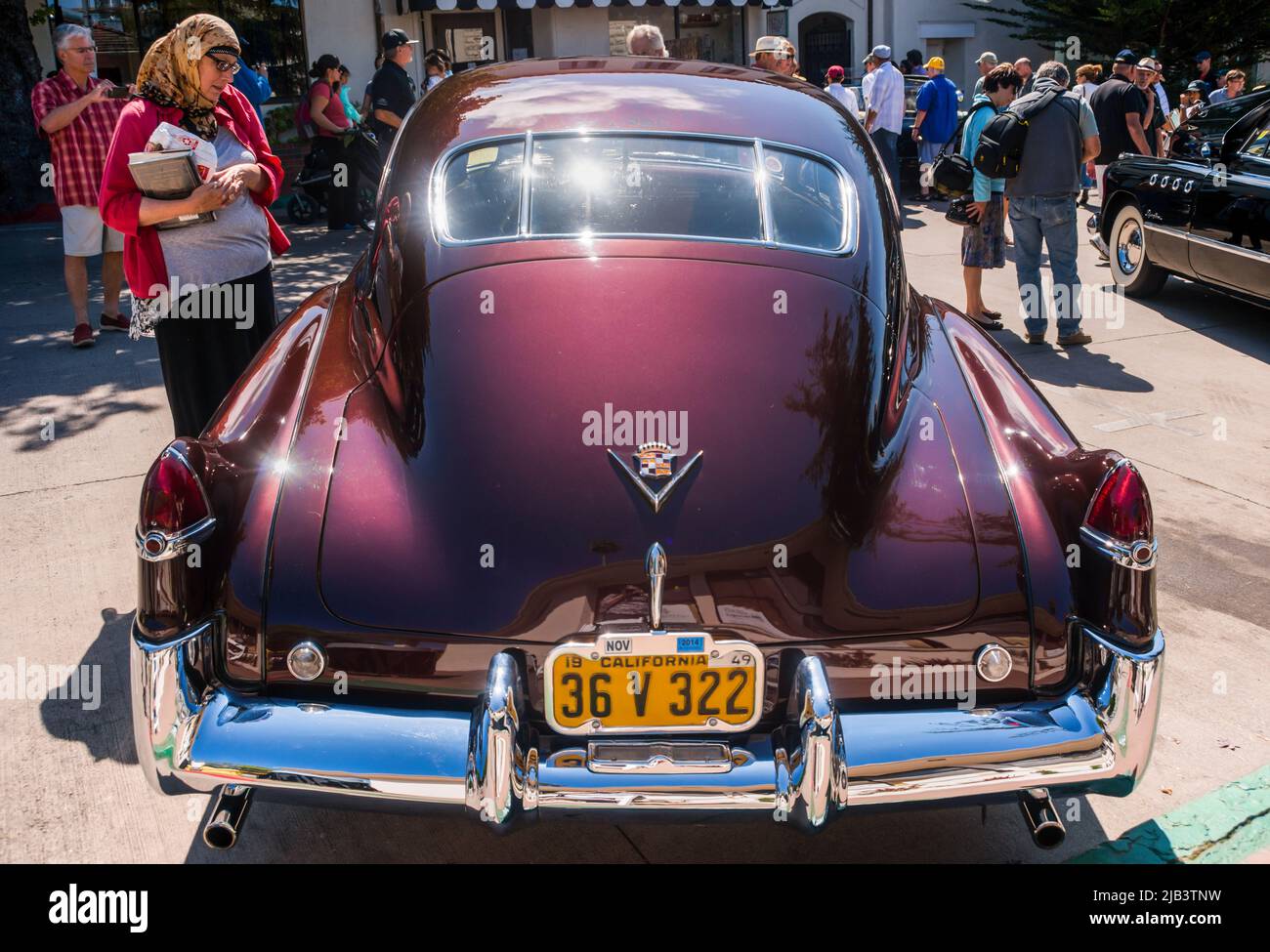 Spectators enjoy classic cars in downtown Carmel, seen at the Carmelby