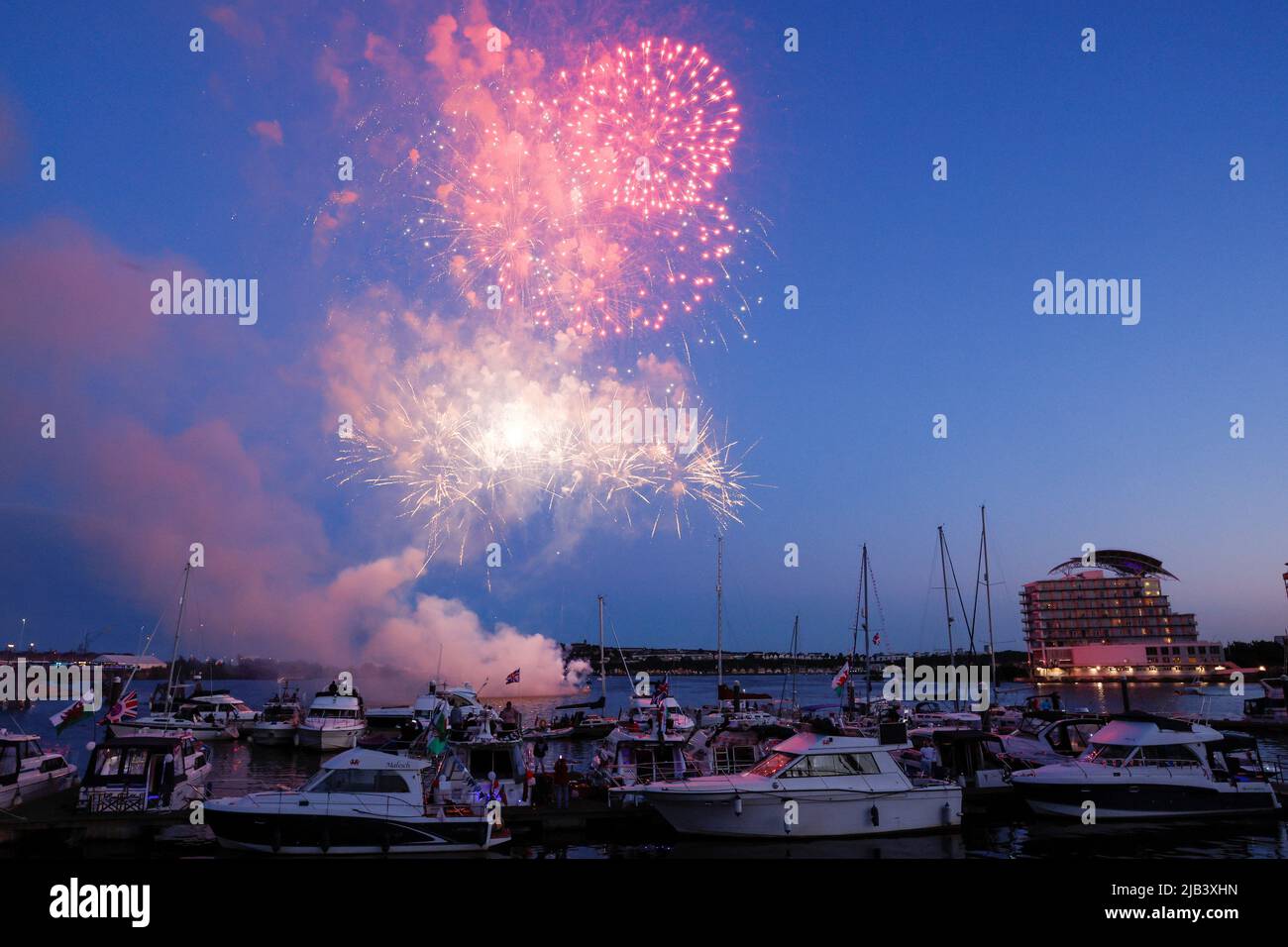 Fireworks are set off as the beacon is lit outside Pierhead Building in