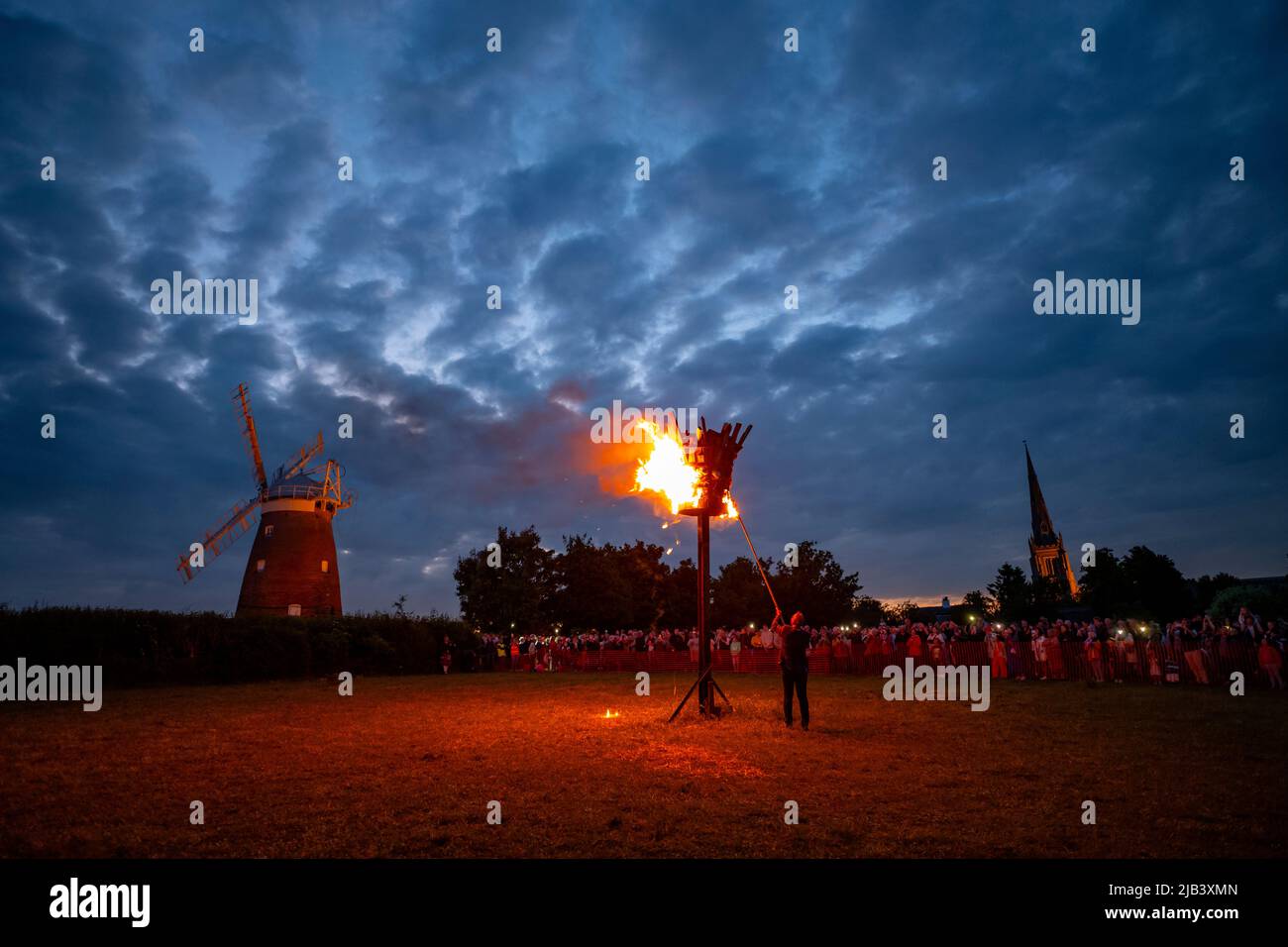 Thaxted, UK. 02nd June, 2022. Thaxted Essex Beacon Lighting Ceremony Platinum Jubilee 2 June 2022 With John Webbs Windmill and Thaxted Church Photograph by Credit: BRIAN HARRIS/Alamy Live News Stock Photo