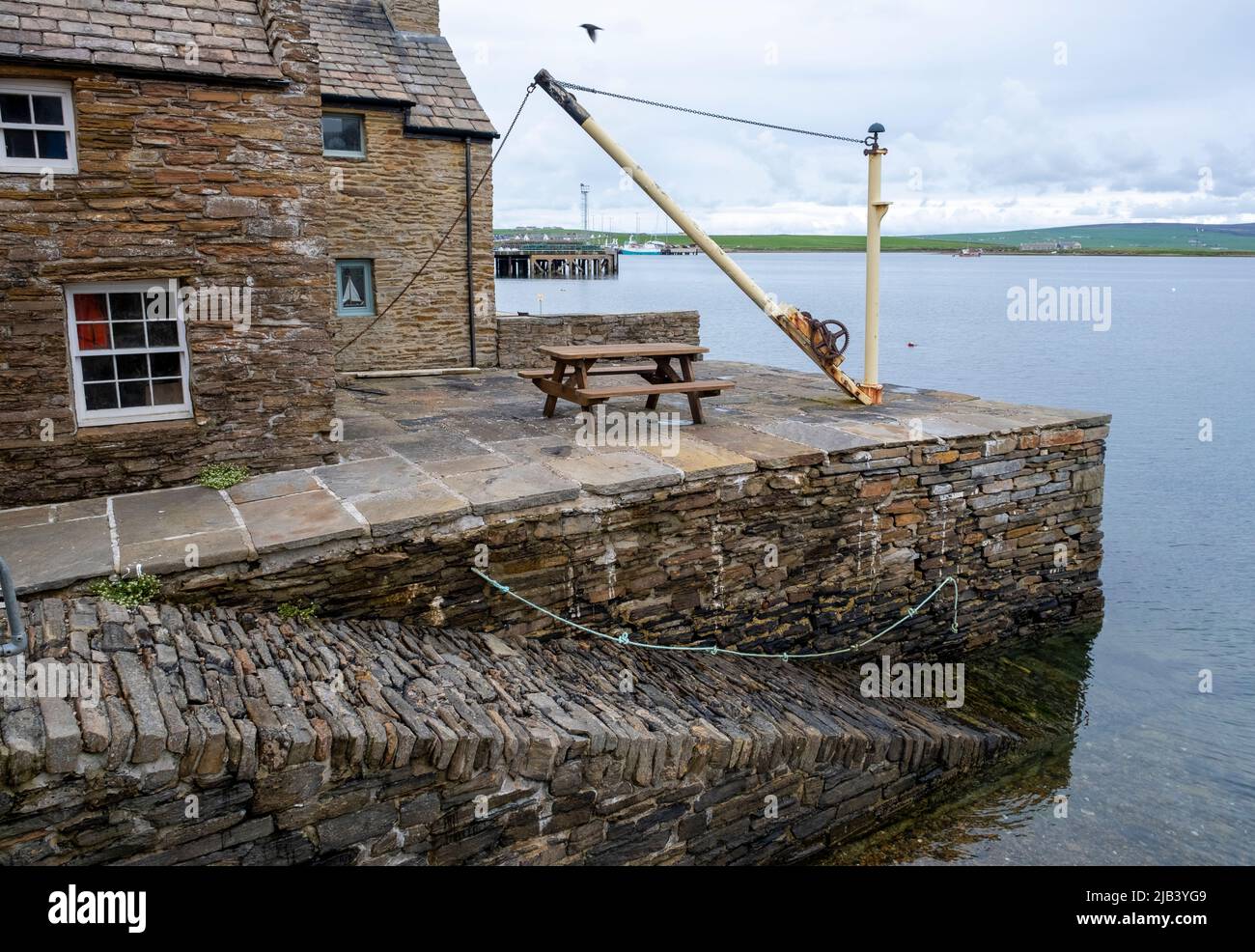 Traditional stone built houses overlooking Stromness Harbour, Orkney mainland, Orkney Islands, Scotland. Stock Photo